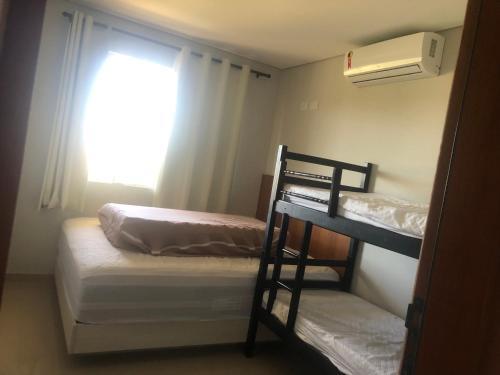 Ένα ή περισσότερα κρεβάτια σε δωμάτιο στο Apartamento encantador