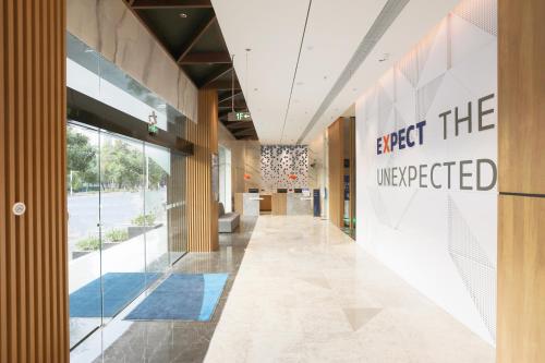 Ο χώρος του λόμπι ή της ρεσεψιόν στο Holiday Inn Express Shantou City Center by IHG
