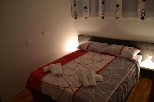 Katil atau katil-katil dalam bilik di Apartments Zadar 4 You