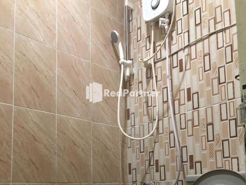 Koupelna v ubytování Seungit Syariah Inn Tebet Mitra RedDoorz
