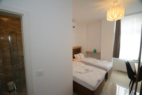 Letto o letti in una camera di Hannover Zimmervermietung Mardino