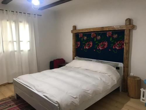 Giường trong phòng chung tại La noi la Munte