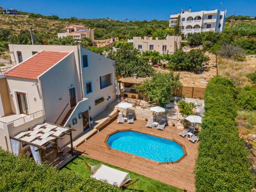 an aerial view of a house with a swimming pool at Villa Ellovos with Private Pool in Rethymno Town