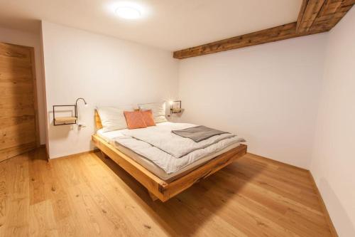 Postel nebo postele na pokoji v ubytování Alpenblick de Luxe
