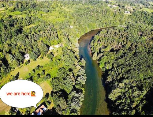 an aerial view of a river in a forest at Vacation House Spiritus Flumine in Netretić