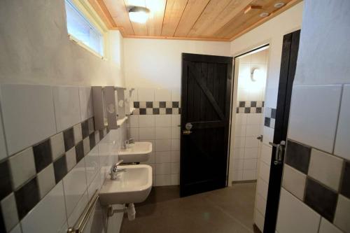 Baðherbergi á Vakantiewoning Boerderij De Gerrithoeve