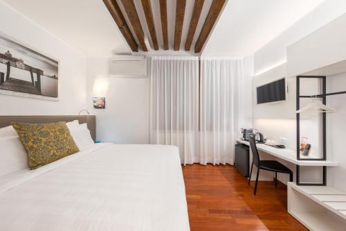 Postel nebo postele na pokoji v ubytování Spadaria San Marco Guest House