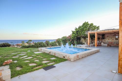 Бассейн в Amatu Villa (Hermes) или поблизости