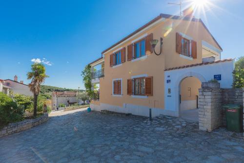 a large house with a driveway in front of it at Villa Asi in Vrsar