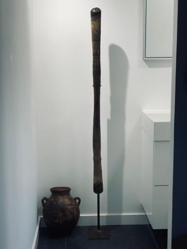 a vase and a stick in a room at Appart standing avec vue grand balcon - parking - clim in Cassis