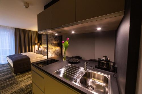 Kuchyň nebo kuchyňský kout v ubytování Kranz Parkhotel