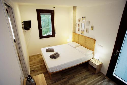 Ένα ή περισσότερα κρεβάτια σε δωμάτιο στο Bagus Room