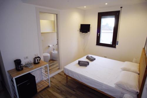 Cama o camas de una habitación en Bagus Room