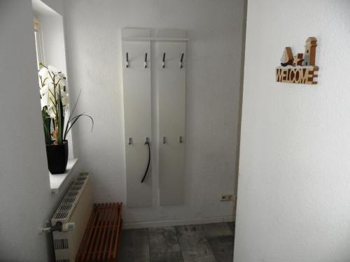 a bathroom with a walk in shower in a room at Gartenhaus Diana - 120 m zum Strand in Bansin