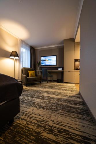 TV a/nebo společenská místnost v ubytování Kranz Parkhotel