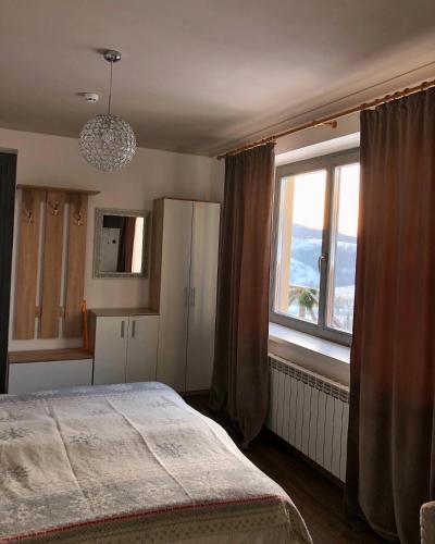 Postel nebo postele na pokoji v ubytování M.A.K.home