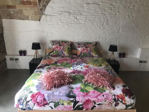 Säng eller sängar i ett rum på Karaktervolle modern uitgeruste woning - Casa Di Martile