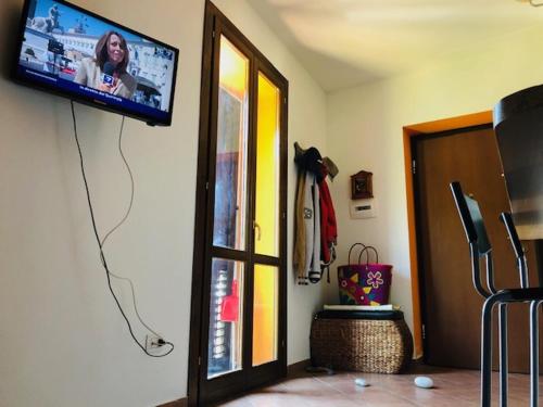 TV a/nebo společenská místnost v ubytování Casa 4 Novembre