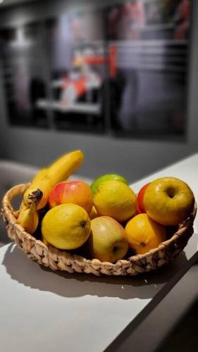 a basket of fruit sitting on a counter at Mónaco in Montevideo