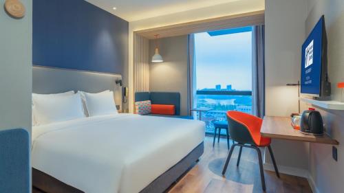 Postel nebo postele na pokoji v ubytování Holiday Inn Express Yangjiang City Center by IHG