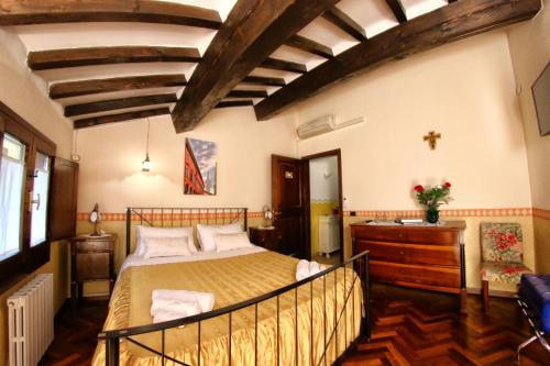 Postel nebo postele na pokoji v ubytování B&B Le Noci di Feo