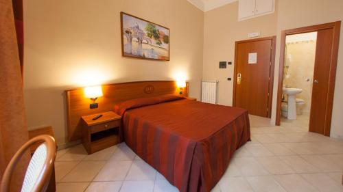 Ein Bett oder Betten in einem Zimmer der Unterkunft Dama Private Rooms