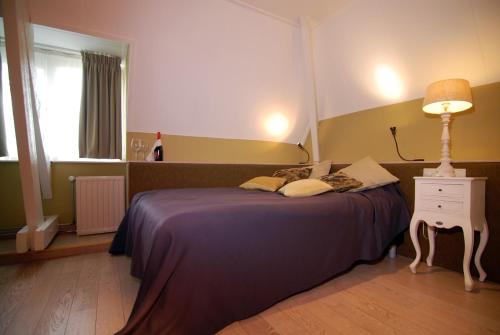 Ένα ή περισσότερα κρεβάτια σε δωμάτιο στο Hotel Inkelshoes