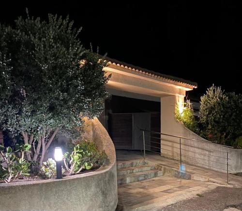 a house at night with a light in front of it at Mariana Plage in La Marana