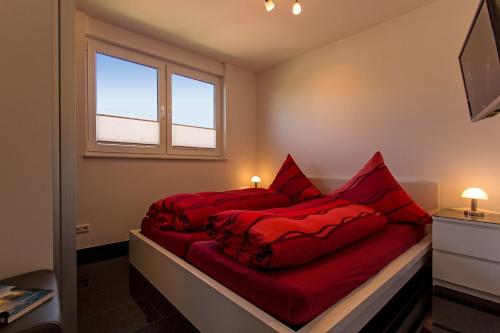 Postel nebo postele na pokoji v ubytování Ferienwohnung Gertrud Wohnung 4