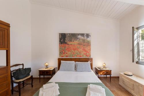 Katil atau katil-katil dalam bilik di Masseria Zanzara