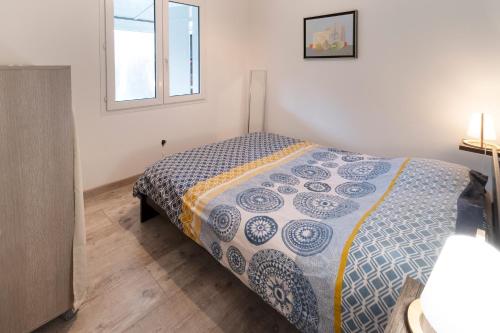 Postel nebo postele na pokoji v ubytování La Cotinette