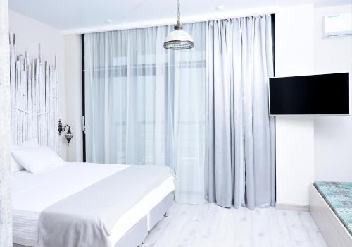 Φωτογραφία από το άλμπουμ του Bazalt club hotel σε Tsandrypsh