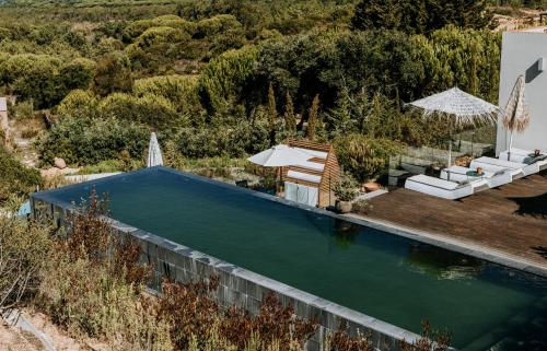 an image of a swimming pool in a villa at Eco-lodge Villa Epicurea in Sesimbra