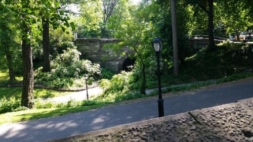 a street light in a park with a tunnel at The Central Park North in New York