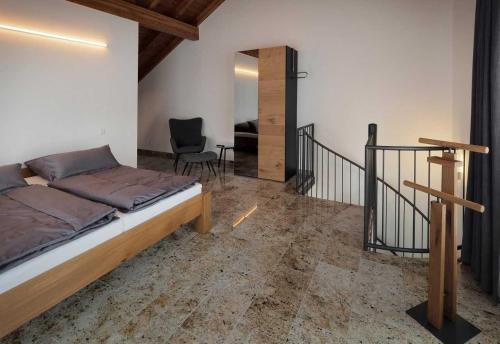 Postel nebo postele na pokoji v ubytování Ferienhaus Alte Glaserei