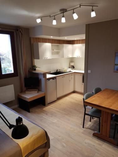 Dapur atau dapur kecil di Résidence L'Atelier