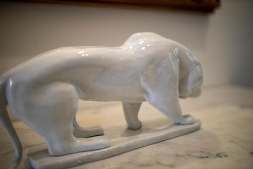 a white statue of a polar bear on a table at IL PALAZZO - Luxury Home & Event in Cosenza
