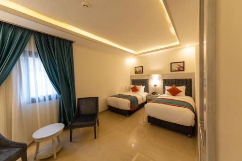 Katil atau katil-katil dalam bilik di Petra Canyon Hotel