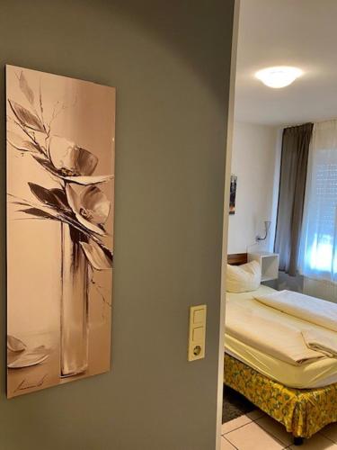 Postel nebo postele na pokoji v ubytování Hotel Nello