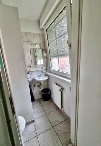 Koupelna v ubytování Hotel Nello