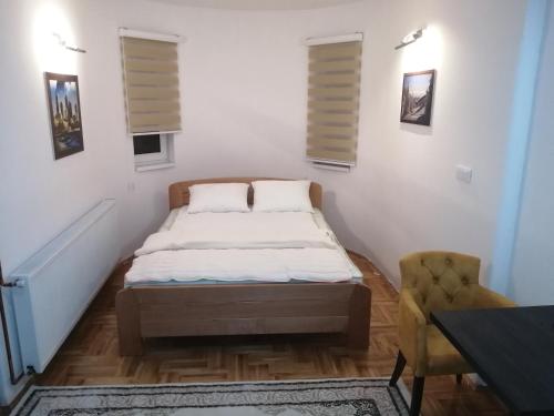 Postel nebo postele na pokoji v ubytování ORTODOKS