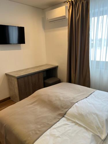 Ένα ή περισσότερα κρεβάτια σε δωμάτιο στο Loft wood
