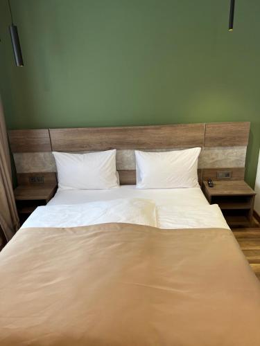Ένα ή περισσότερα κρεβάτια σε δωμάτιο στο Loft wood