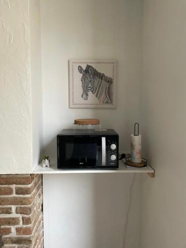 Кухня или мини-кухня в Logement Cosy avec stationnement gratuit
