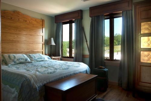 Una cama o camas en una habitación de Hotel Floyd