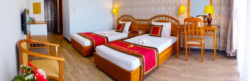 Đồi Dương Hotelにあるベッド