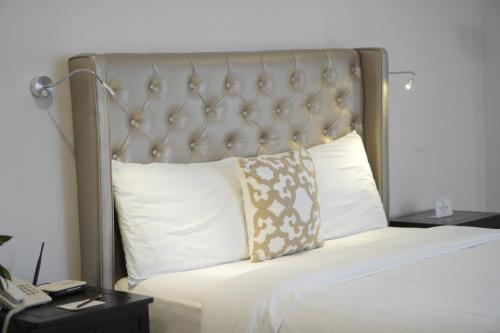 Sta Barbara Residence Hotelにあるベッド