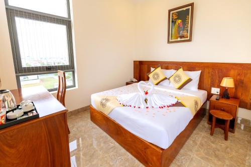Thọ Hướng Hotel - Phan Thiếtにあるベッド