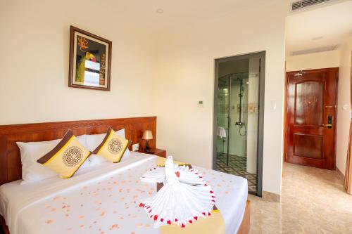 Thọ Hướng Hotel - Phan Thiếtにあるベッド