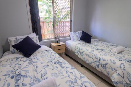 מיטה או מיטות בחדר ב-Meraki Villa